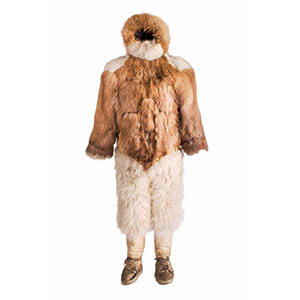 fur jacket with a thick hood tucked into fur pants and boots