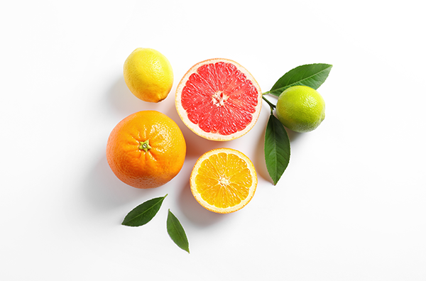 An orange, a grapefruit, a lime, and a lemon
