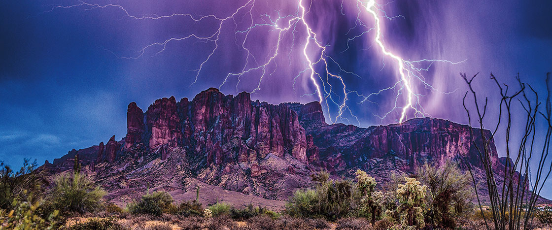 Mountains with lightning striking