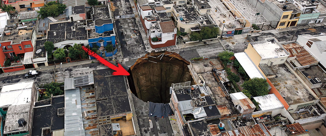 Image of a giant hole in a city